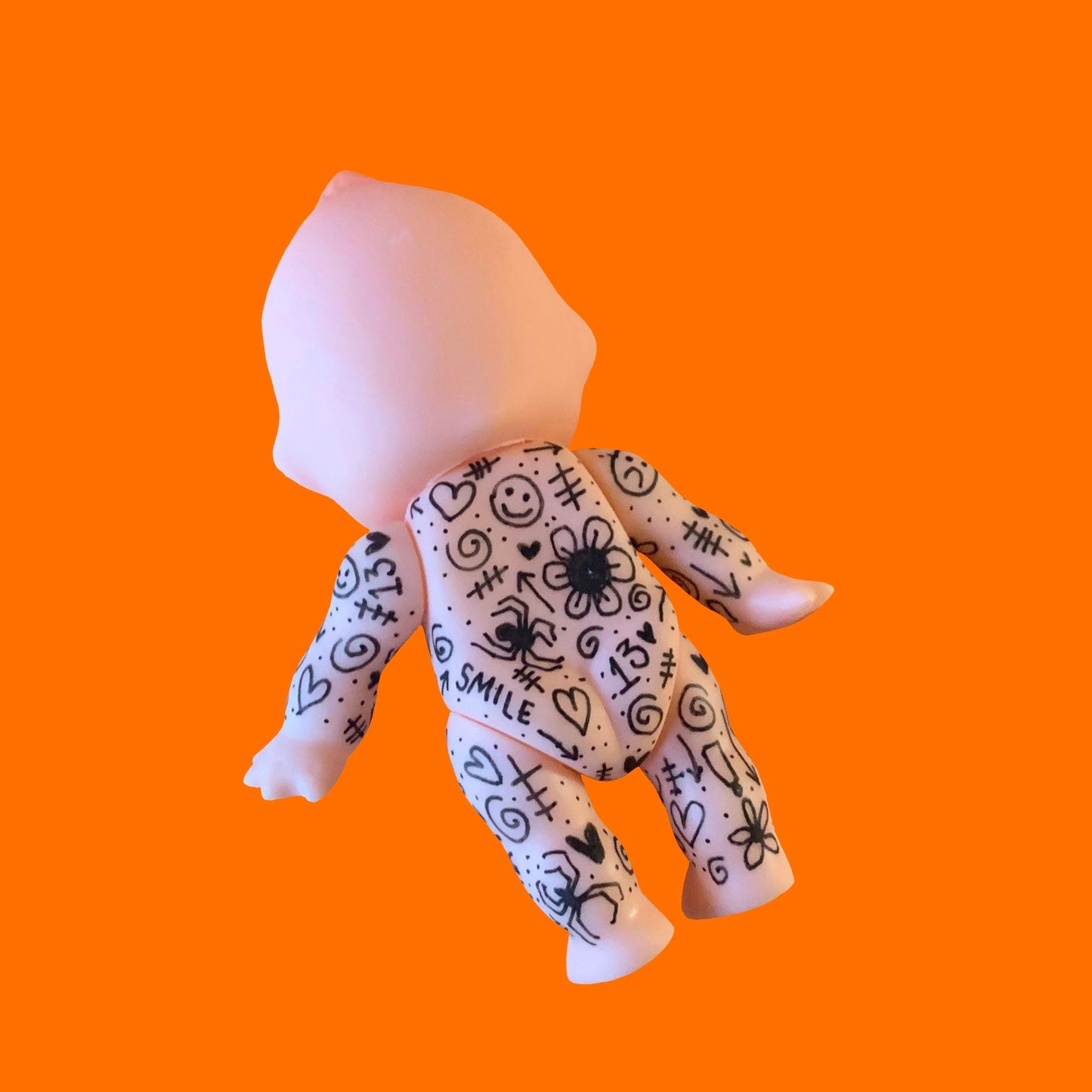 Tattooed Kewpie Doll
