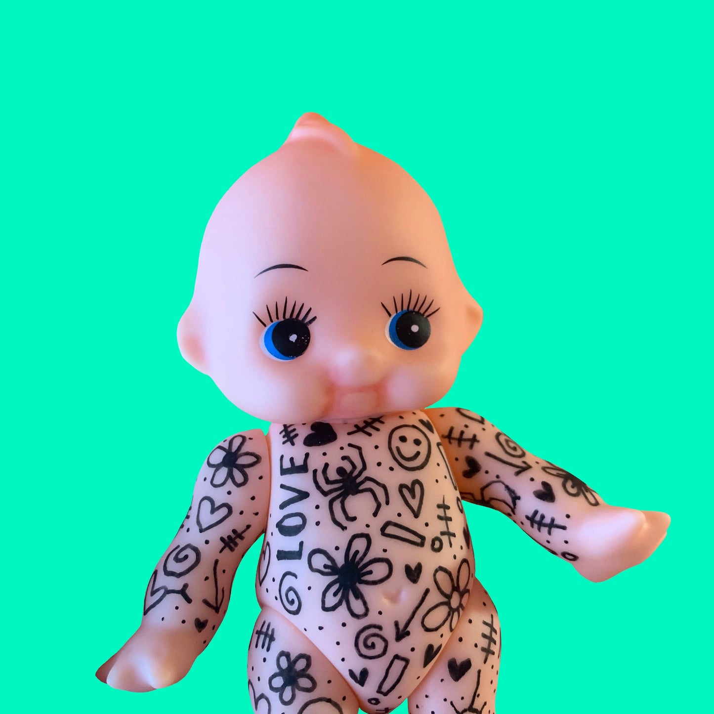 Tattooed Kewpie Doll