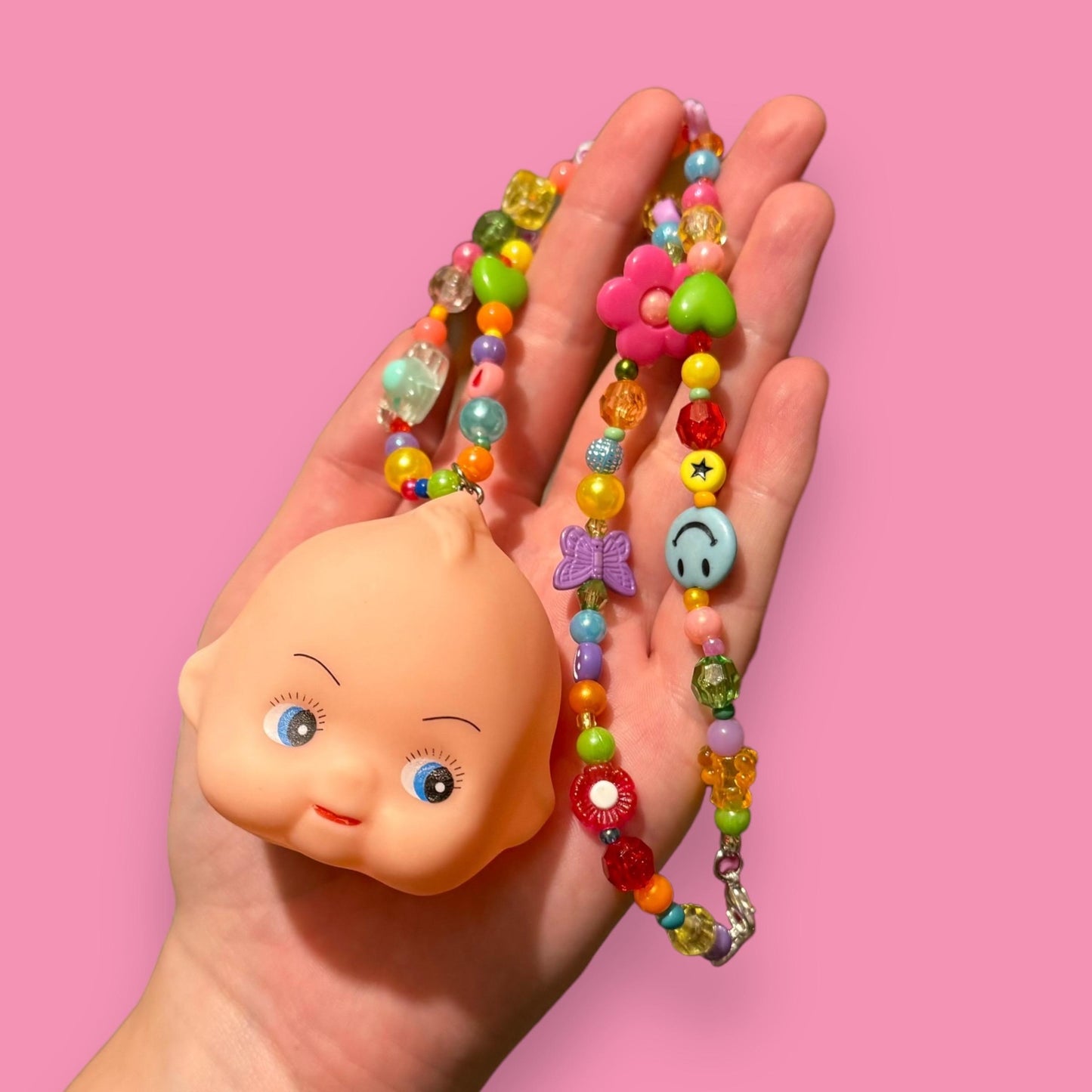 Kewpie Baby Doll Head Bead Necklace