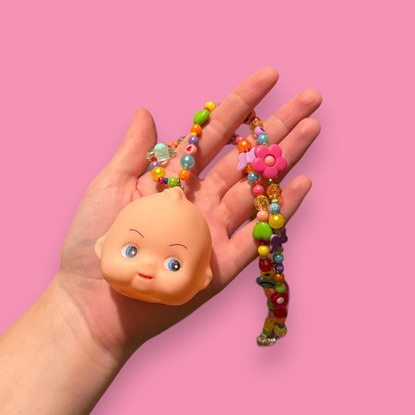 Kewpie Baby Doll Head Bead Necklace