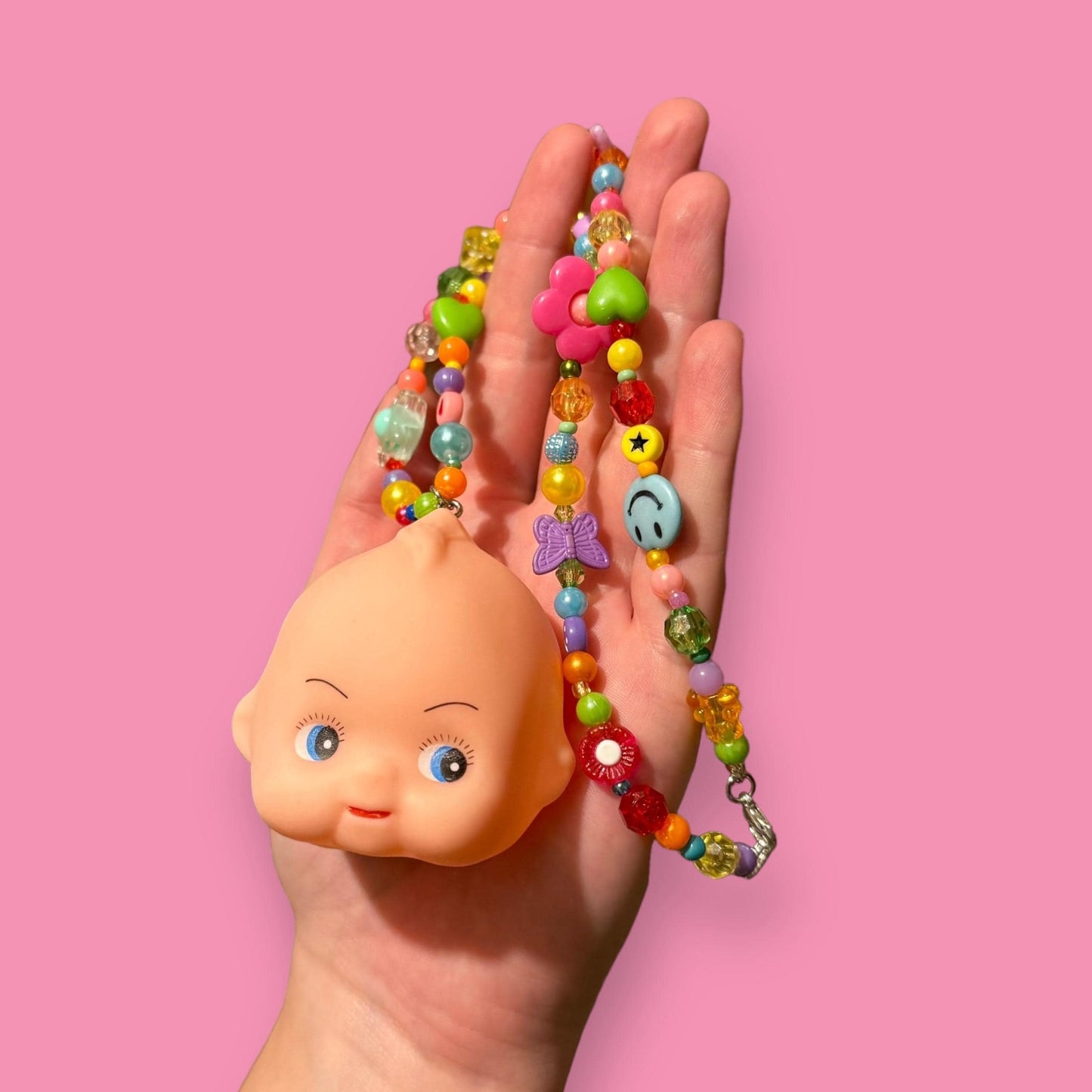 Kewpie Baby Doll Head Bead Necklace