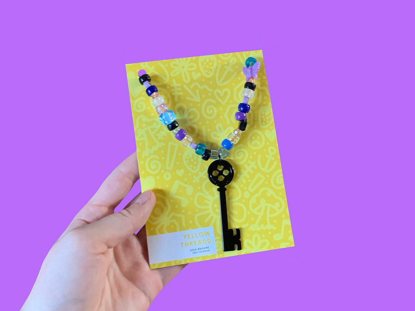 Coraline key bead necklace